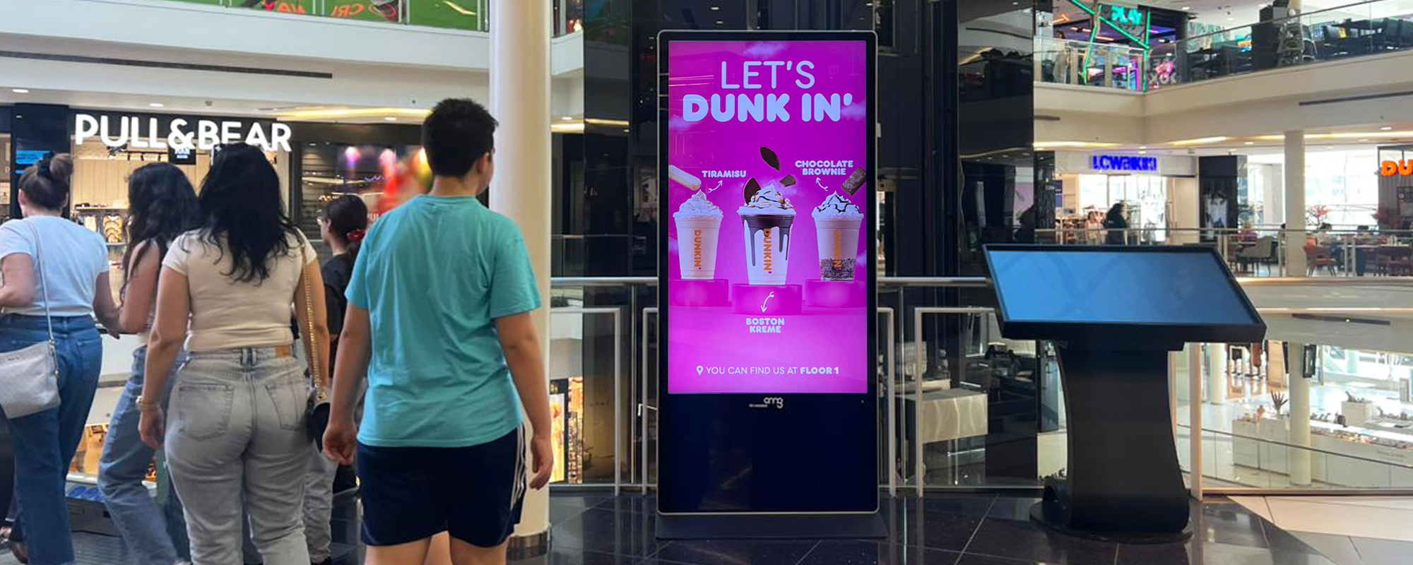 Outdoor advertising media placement in a retail mall environment